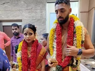 Varun Chakravarthy and Neha Khedekar marriage picture