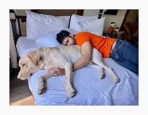 gurfateh singh pirzada with his pet dog berlin