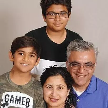 archana shinde keswani with her husband and sons