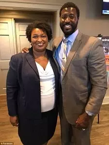 stacey abrams with her brother-in-law jimmie gardner