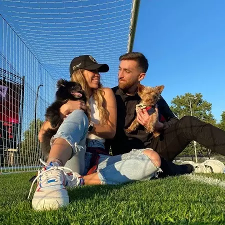 matt turner and ashley herron with their pet dogs