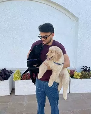 veer pahariya with his pet dogs