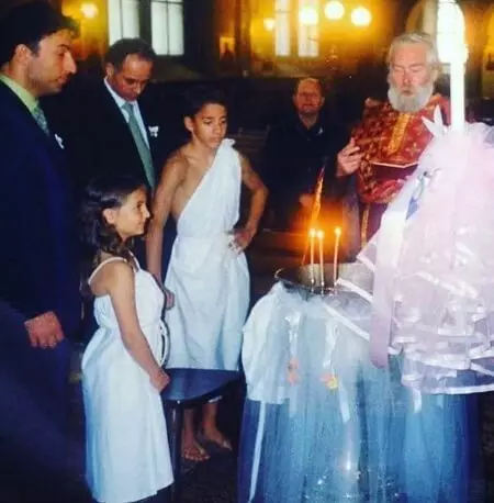 Elli AvrRam and her brother Konstantin Avramidis getting baptized