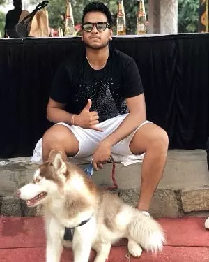 vyshak vijaykumar with his siberian husky pet dog