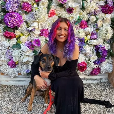 isabella astor with her pet dog