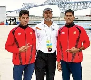 arjun lal jat and arvind singh with coach ismail baig
