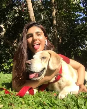 medha rana with pet dog breezer