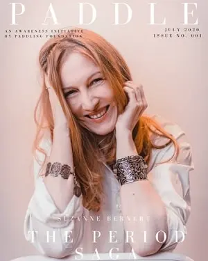 suzanne bernert on the cover page of paddle magazine