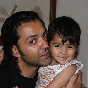 childhood picture of dharam deol with father bobby deol