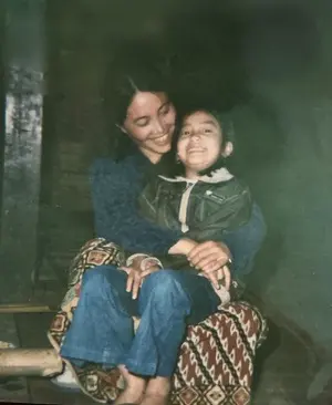 childhood picture of tengam celine koyu with her mother