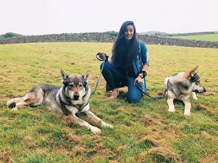elixir nahar with her pet dogs