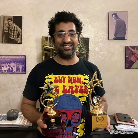 vikram kochhar with his awards