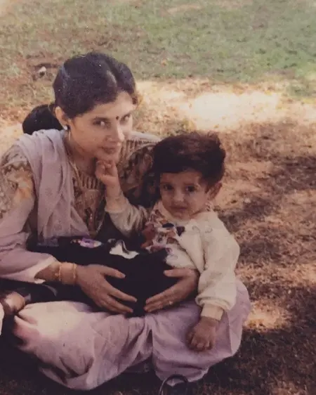 childhood picture of skand thakur with his mother