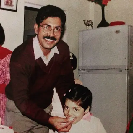 childhood picture of divita rai with father dilip rai