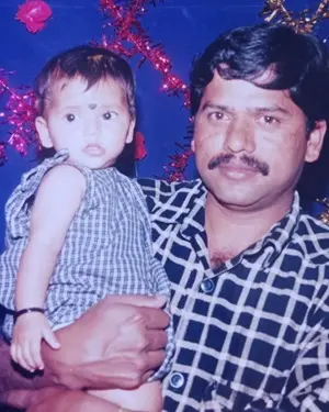 childhood picture of madhumitha hirannaiah with her father