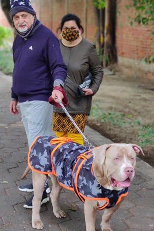 rajesh chopra and ranju chopra with pet dog soldier chopra